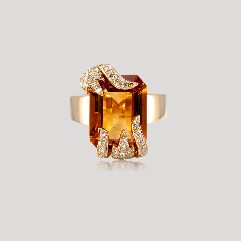 32700443-bague-pierre-orange-et-diamants-1